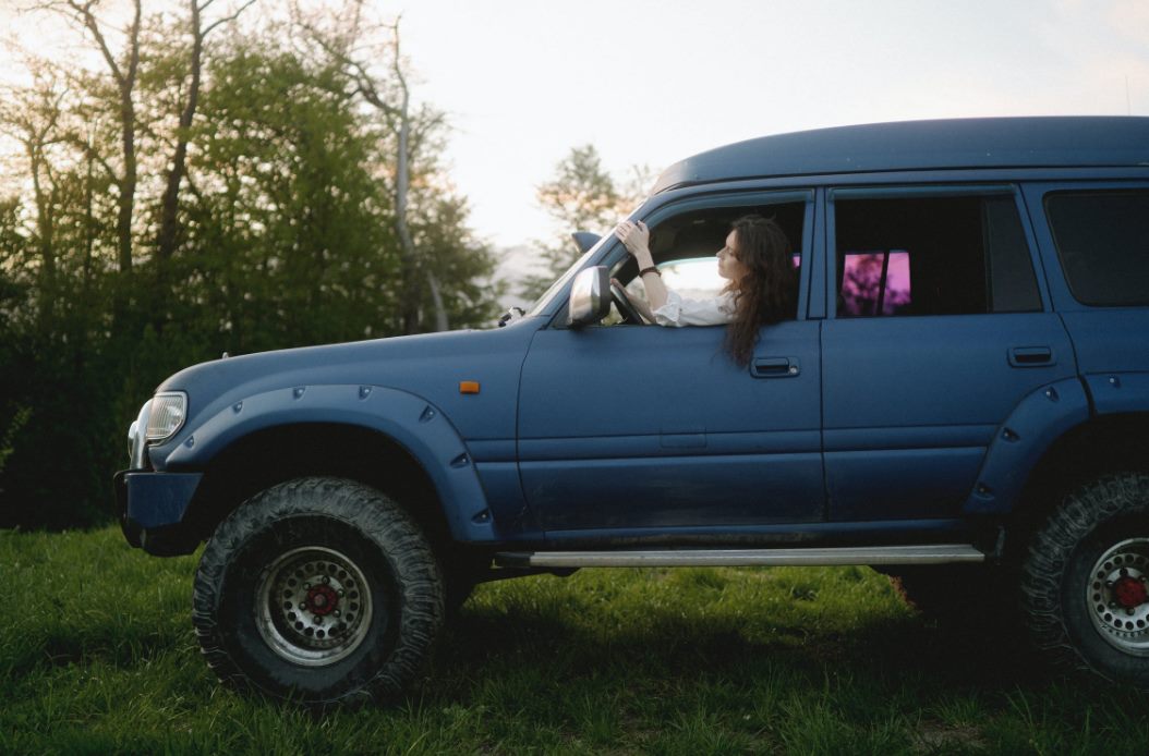 a woman driving a vehicle · free stock photo goo