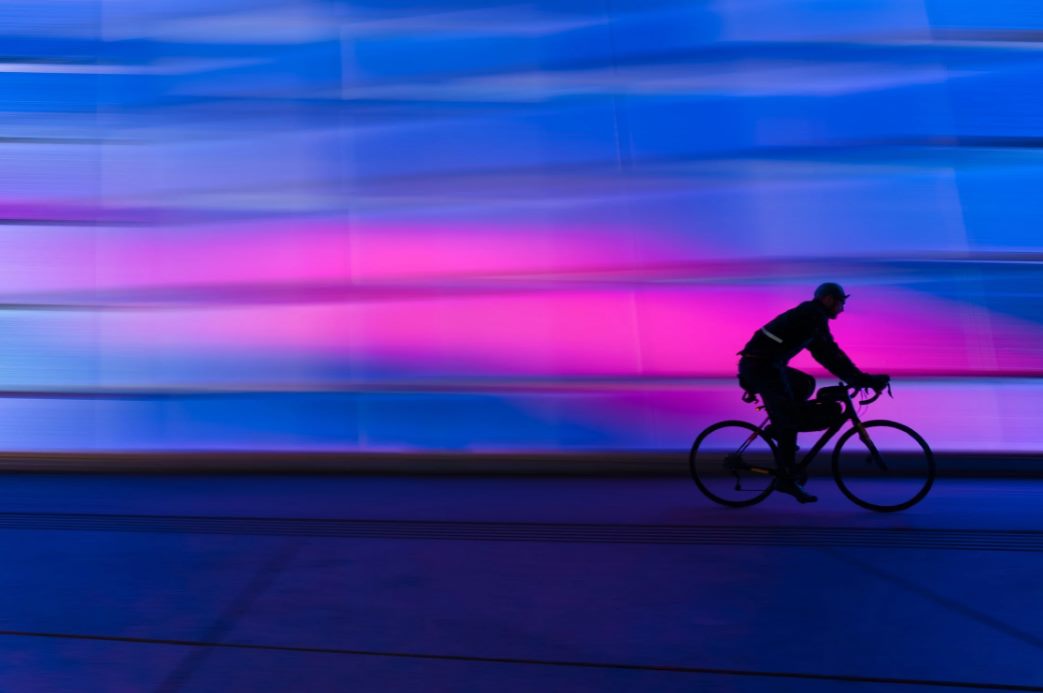 silhouette of person riding on commuter bike · fre