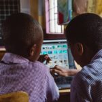 two boys using a laptop · free stock photo googl