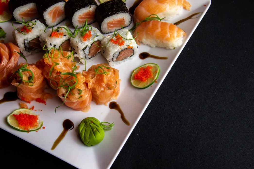white ceramic plate filled with sushi · free stock